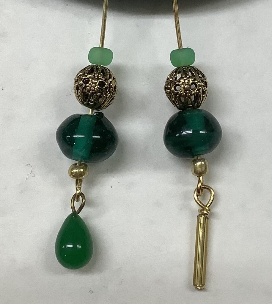 photo showing two different earring designs
